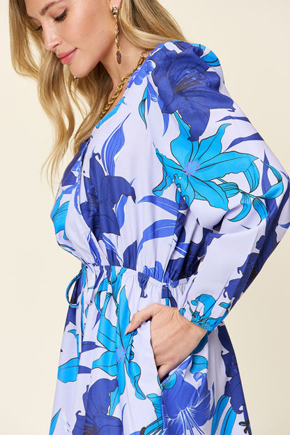 Bloom Breeze Floral Long Sleeve Romper