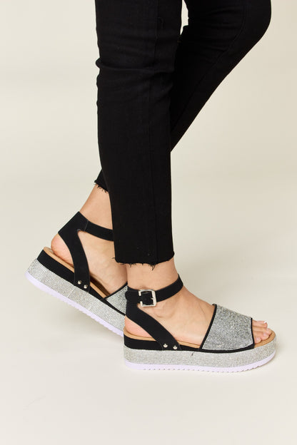 Glimmer Glow Wedge Sandals