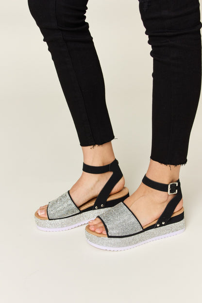 Glimmer Glow Wedge Sandals